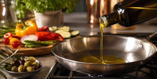 Golden-green olive oil poured from a dark bottle into a hot frying pan on the stove