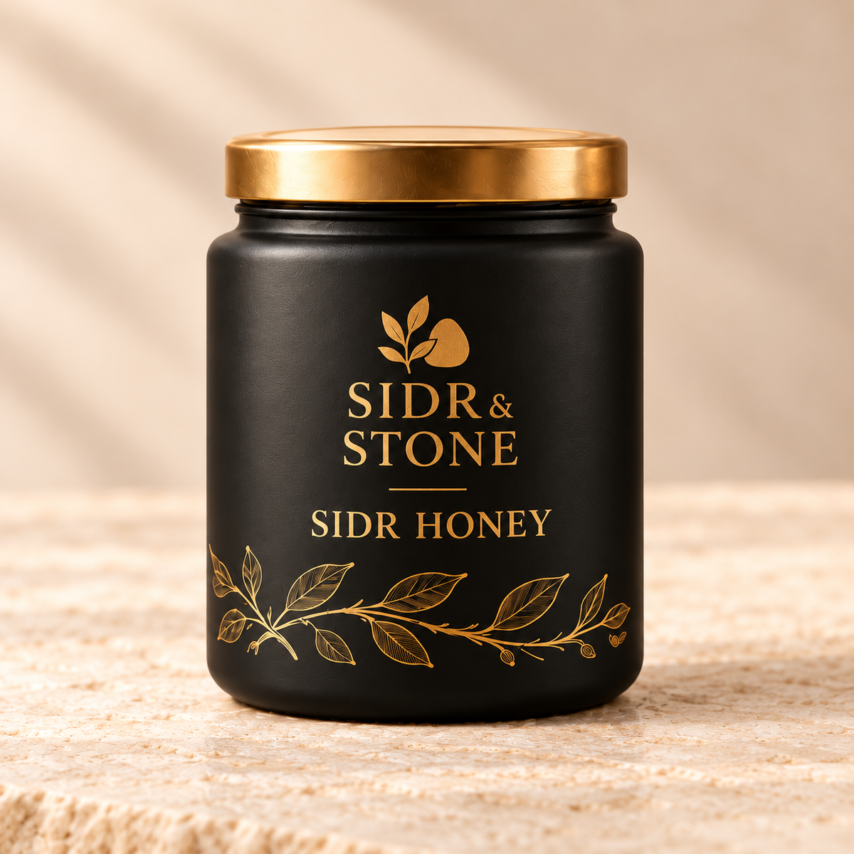 Sidr & Stone Sidr Honey packaging concept photographed on a warm stone surface